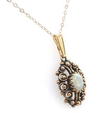 14k Gold Oval Genuine Natural Opal Pendant with Pierced Scrollwork (#J6226)